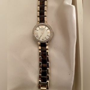 Gold tone and tortoise shell Fossil bracelet watch